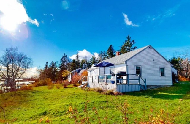 "THE WAY LIFE SHOULD BE"nWATERFRONT OASIS/ HARBOR VIEWS AND A SHARED DOCK.n