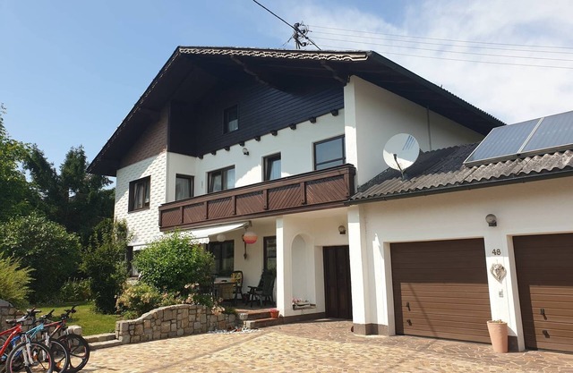 This apartment is located in the Alps next to the ski slopes and mountain lakes.