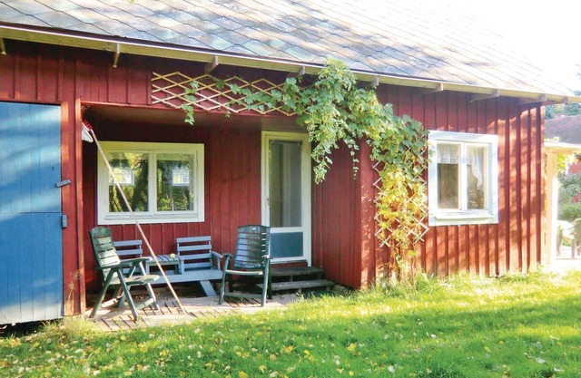 This cottage is surrounded by a beautiful garden and is close to good fishing and swimming spots.