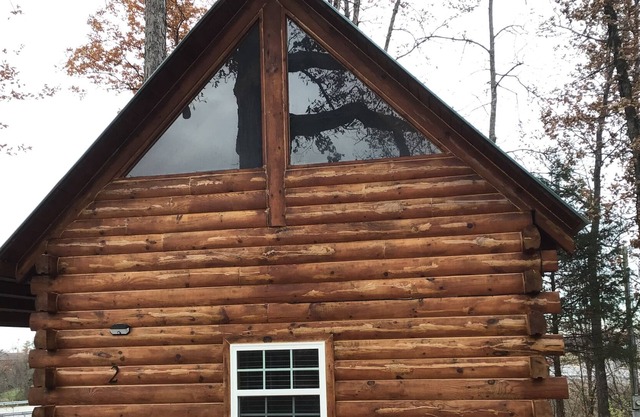 This cozy log cabin has a private entrance