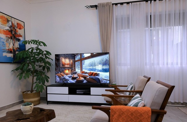 This modern home is located in Kololo a safe & green area known for its comfort.