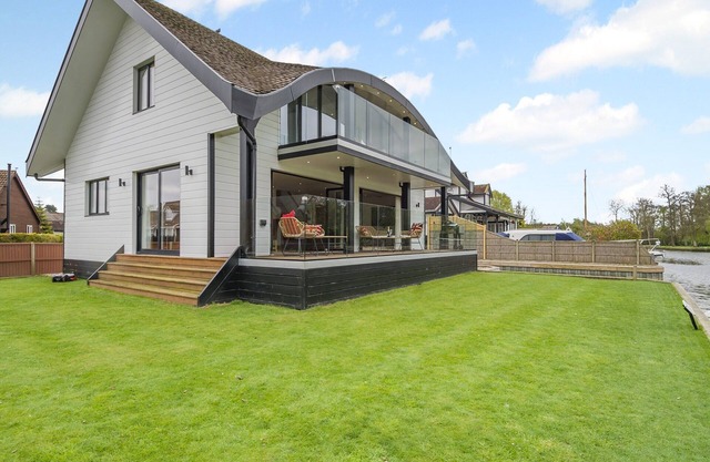 This stunning waterside home offers an amazing space for families and friends.