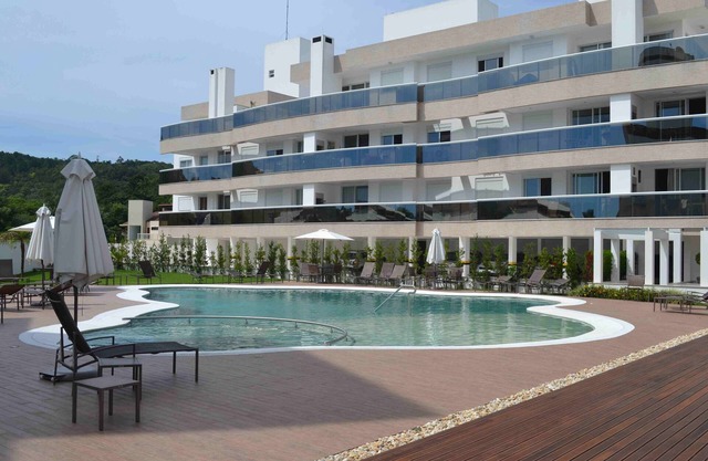 Three Bedroom Apartment - upscale condominium with pool and garage