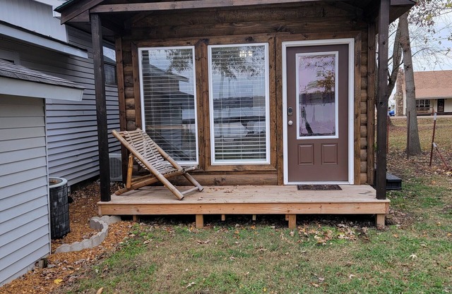 Tiny house on the lake With a seventy five inch t v free internet walk shower