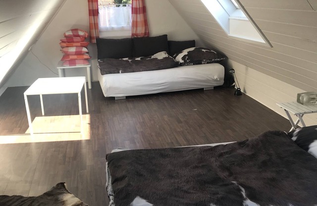 Top floor apartment over two floors with quiet balcony and partial air conditioning