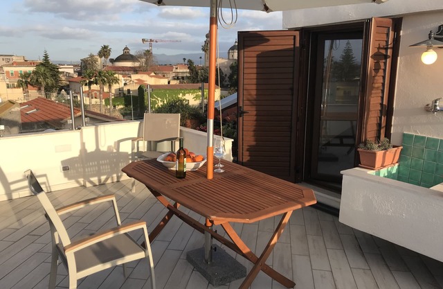 Top floor small loft overlooking the old town near to the beach