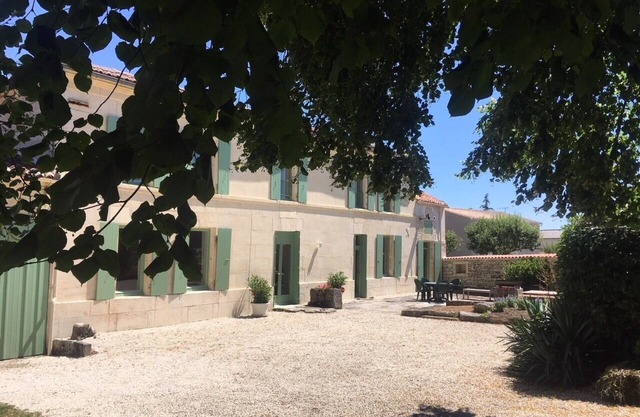 Traditional Charentaise house with safe heated swimming pool for children.