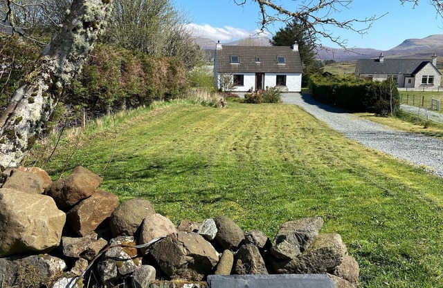 Traditional Croft House with garden. Ample parking and central location.