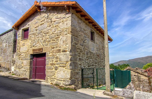 Traditional stone house with cozy interior.