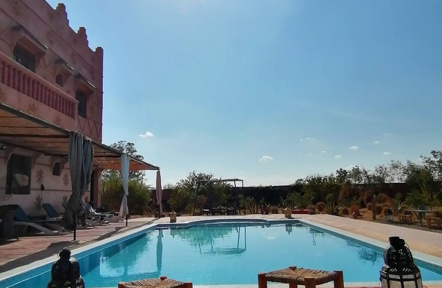 Traditional villa with pool on plain nature