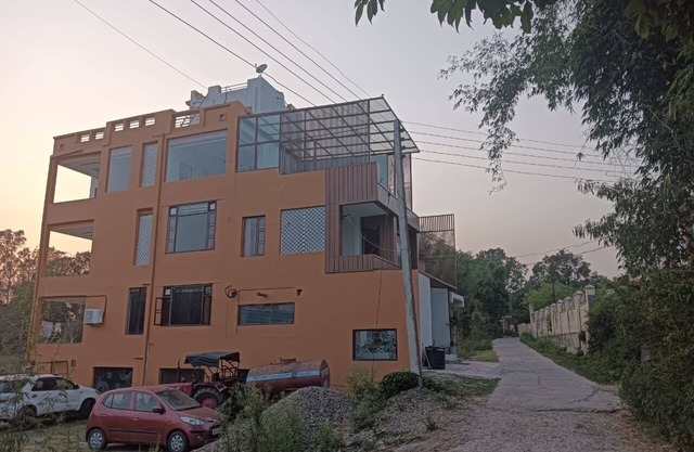Tranquil Homestay Near Sacred Flames where Comfort Meets Devotion in the Hills.