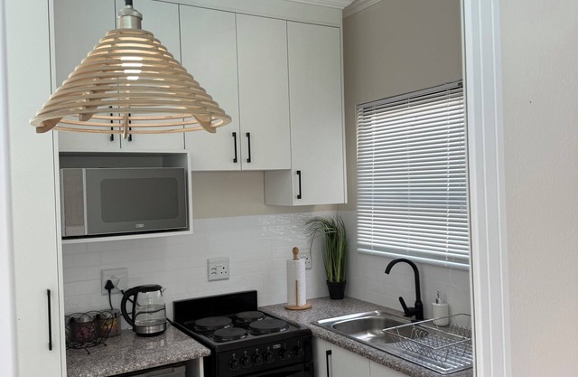 Tranquil One bedroom poolside apartment