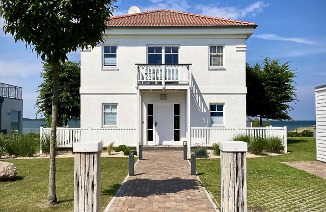Traumferienhaus Sliminde by Seeblick Ferien ORO, direkte Wasserlage E-Säule 6 Pers