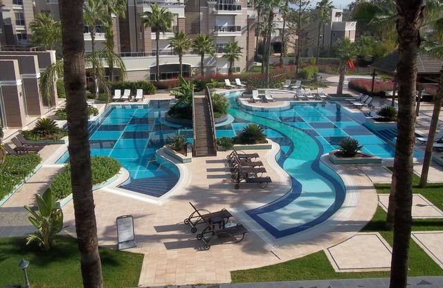 TROPICAL GARDENS ; spacious ground floor 2 bed home
