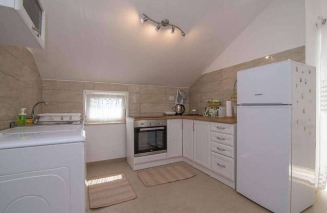 Two bedroom apartment with balcony and sea view Bonić, Lošinj (A-23056-c)