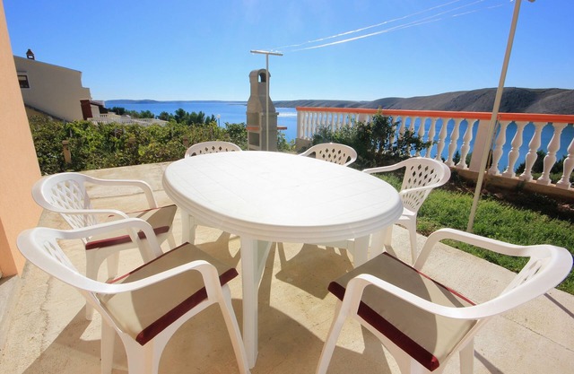 Two bedroom apartment with terrace and sea view Vlašići, Pag (A-9324-b)