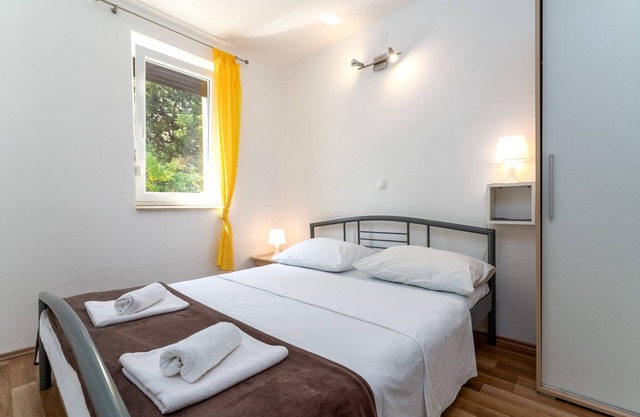 Two bedroom apartment with air-conditioning Baška, Krk (A-11933-a)