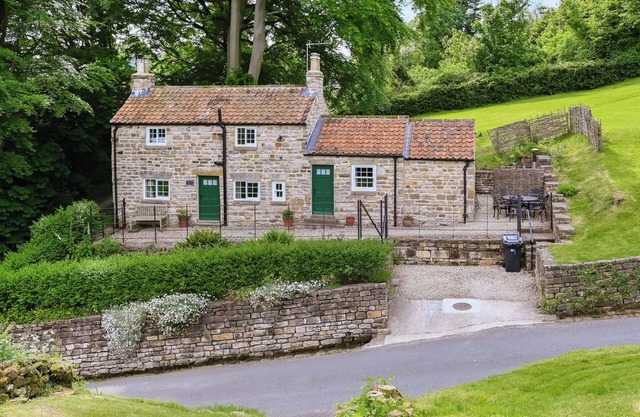 Two bedroom cottage packed with character with stone floors and wood burner.