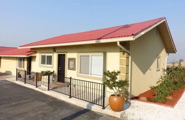 Two cottages with king bed bedrooms, dining area and full kitchen.