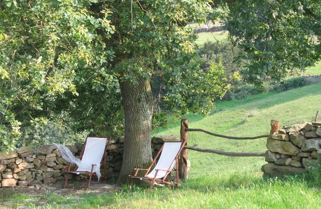 Typical dwelling of the valley of the Pas located in a farm of green pastures