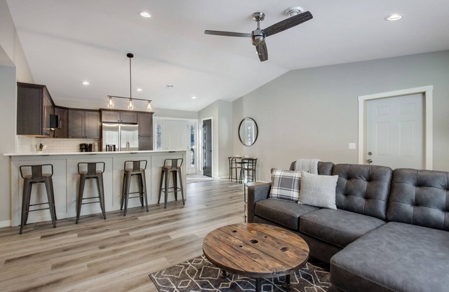 Up North Living! Fully renovated one-level living home in wooded lot near lake.