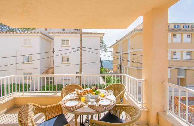 Vacation Apartment Talaia 1A with Balcony, Wi-Fi, Garden & Terrace