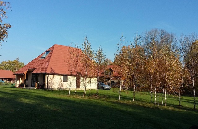 Vacation apartment surrounded by meadows and forests and a swimming lake nearby