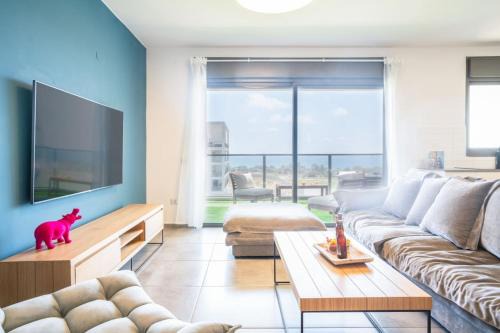 Vibrant Seaside Stay with Balcony by Sea N' Rent