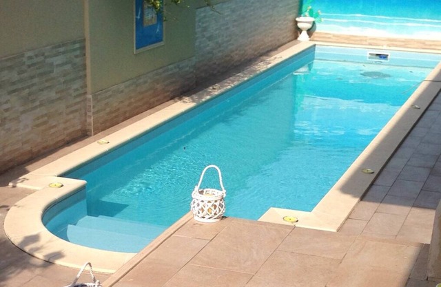 Villa Le Tre Palme . Suite in relax . immersed in the green garden with swimming pool