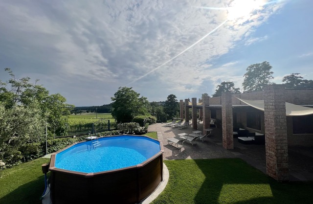 Villa Spaltri is immersed in the green of the hills in Lonato del Garda