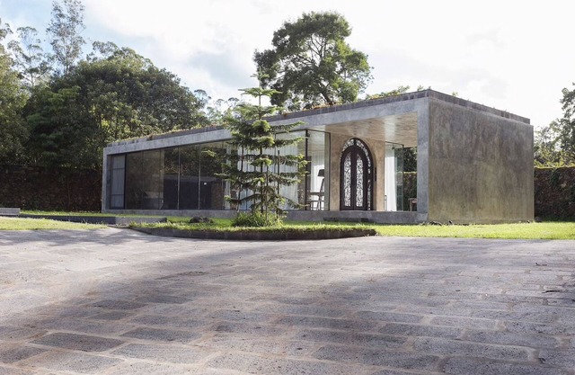 Villa with modern minimalist architecture in the middle of a nature reserve