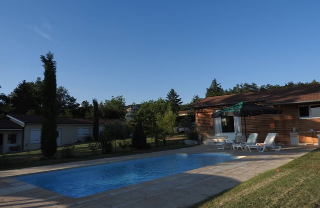 Villa with pool and open view, located towards Lyon .