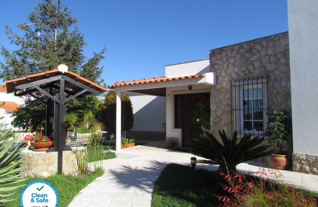 Villa with pool and garden.