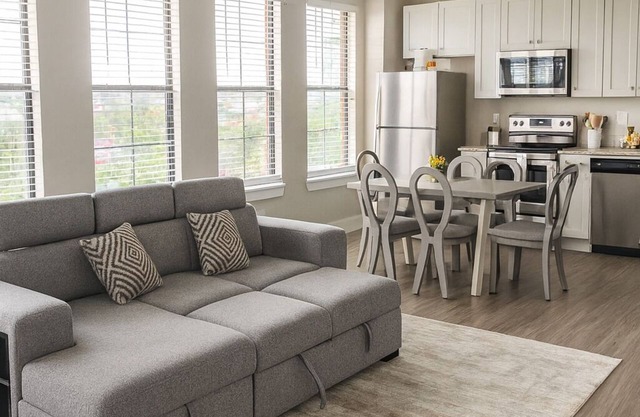Walk to Mercedes-Benz Stadium from your chic city-view Atlanta getaway