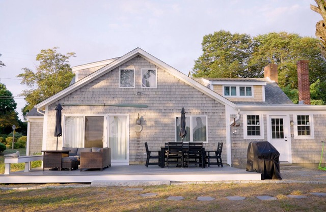 Walk to Rock Harbor Beach from your spacious Orleans coastal retreat