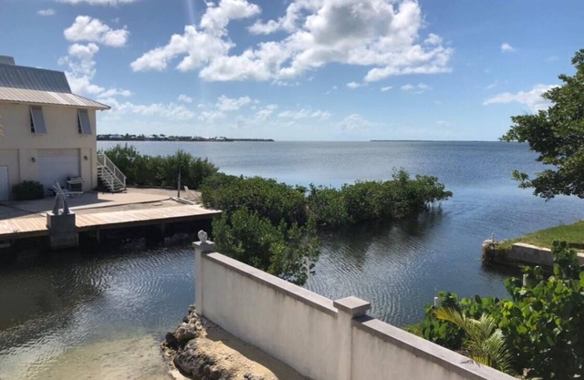 Waterfront beach house with boat ramp