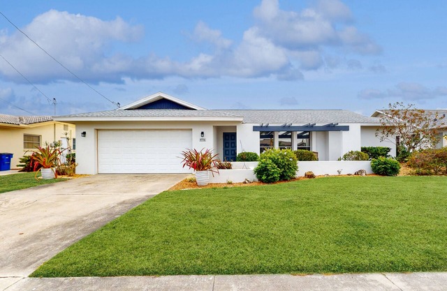 Waterfront home with pool, bikes, grill, fireplace, internet, W/D, & central AC