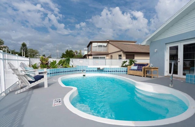 Waterfront Oasis! Private Pool, Dock, Kayaks, Paddle Board, Fishing & More – Relax & Enjoy the Gulf!