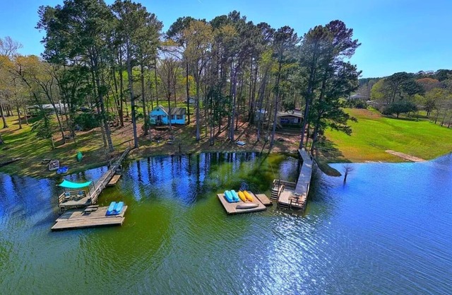 Waterfront with private dock ,boat ramp, paddle boats and Kayaks!nJust Listed!
