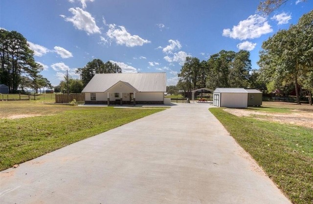 White House Retreat on White Rock Creek home on large acreage on the water