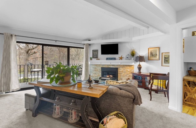 Winter getaway with cozy fireplace in this Elegant Lake Geneva condo