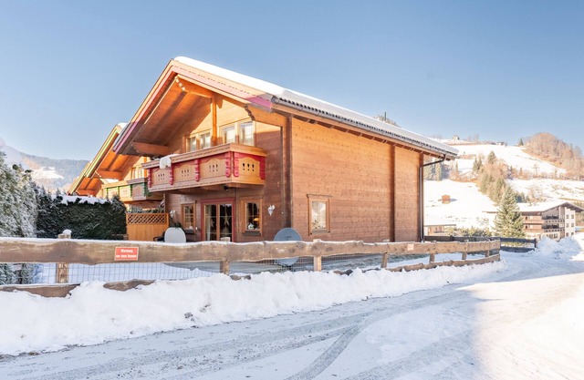 Wooden chalet with shared saunas