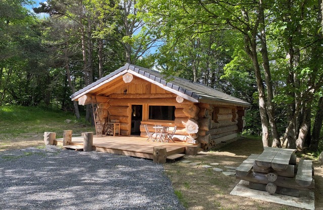 Wooden chalet with all comforts in a forest setting 2 km from the village by footpath.