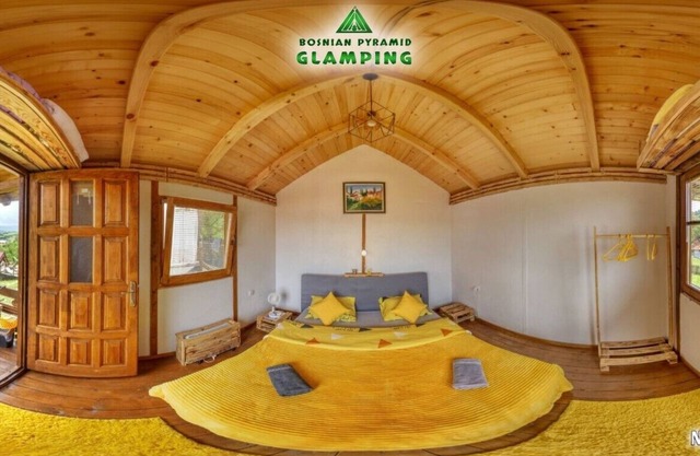 Yellow bungalow Bosnian pyramid glamping