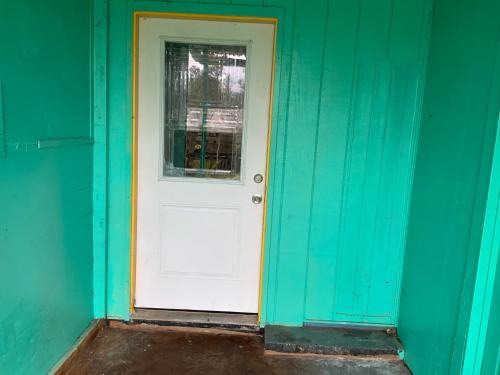 yellow house in tropical forest