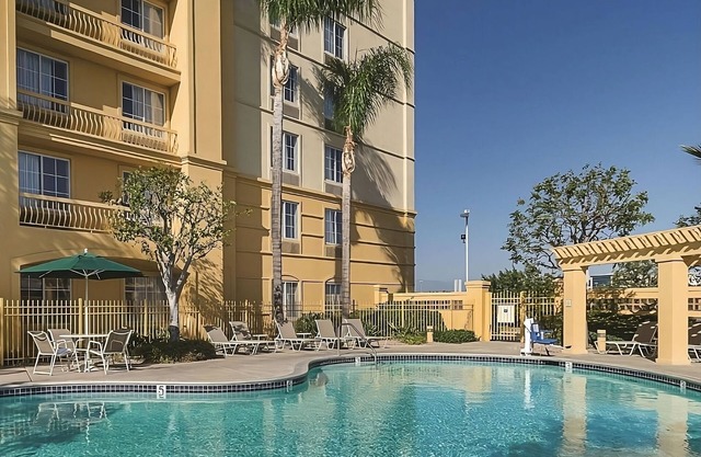 Your Home Away From Home! Amazing unit w/Pool access Near Toyota Arena!