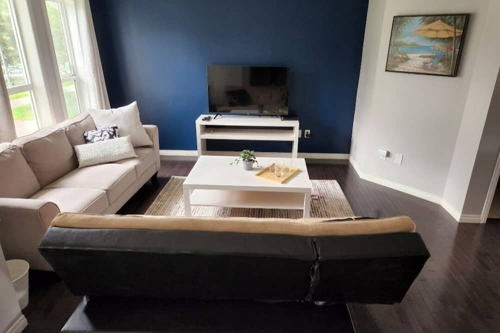 Southeast Edmonton House | House in Summerside with a huge patio and an extra tall garage