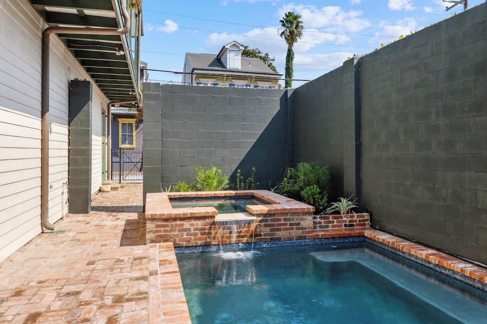 Seventh Ward House | Rustic Industrial Home w heated Pool/Hot Tub, Steps to FQ