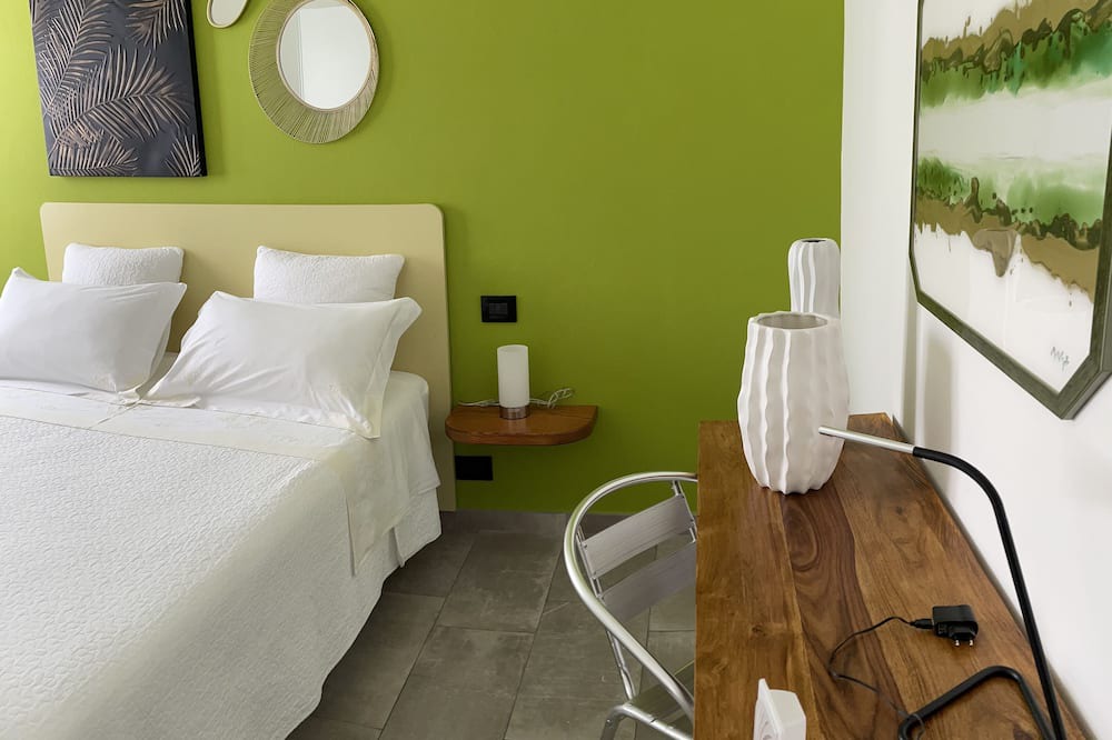 Piumazzo Apartment | Cozy whole apartment in quiet area with indoor car parking.