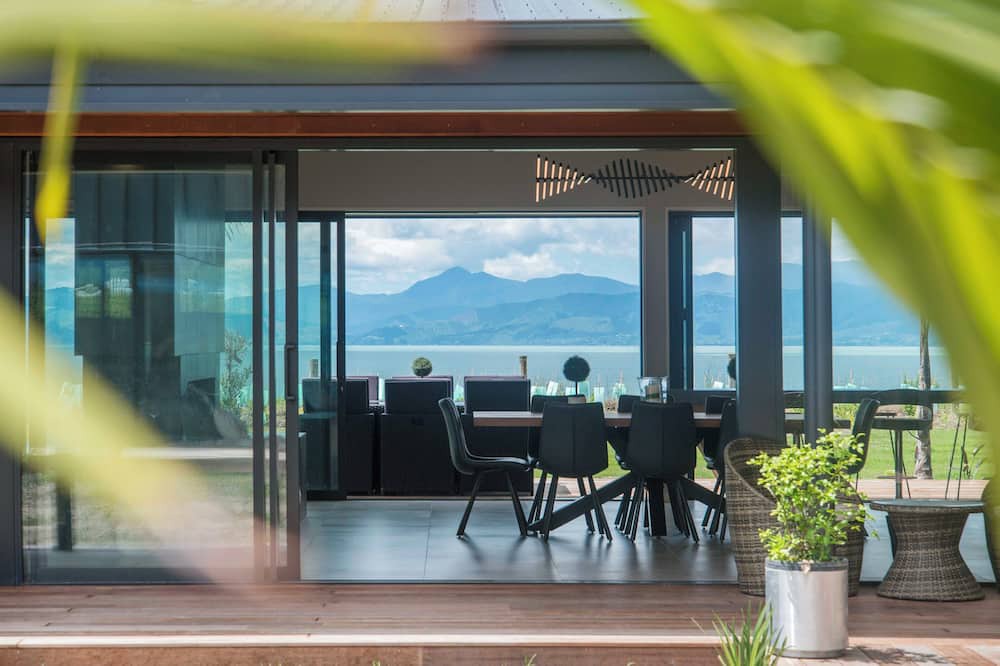 Ruby Bay House | Ruby Bay cliff-top retreat- Palm View with Swimming Pool and Spa